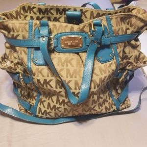 Michael Kors logo bag with teal straps